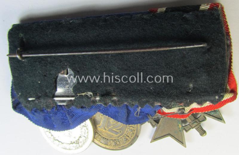 Three-pieced medal-bar (ie. 'Ordenspange') respectively depicting a: 'KvK II. Klasse m. Schwertern' and two: WH (Heeres or KM) so-called: 'Dienstauszeichnungen für 4 u. 12 Jahre Treue Dienste'