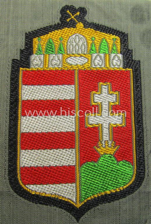 Attractive - and scarcely encountered! - German-produced, 'BeVo'-type armshield showing the coat of arms of Hungary (being a piece that was intended for a volunteer who served within the: 'Deutsche Wehrmacht')