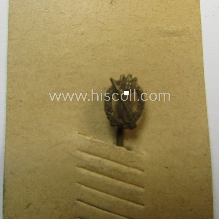 Neat - and only 9 mm. sized! - miniature-lapel-pin depicting an: 'Infanterie Sturmabzeichen in Bronze' (or: bronze-class assault-badge ie. IAB) being a non-maker-marked example that comes mounted onto its period 'LDO'-card