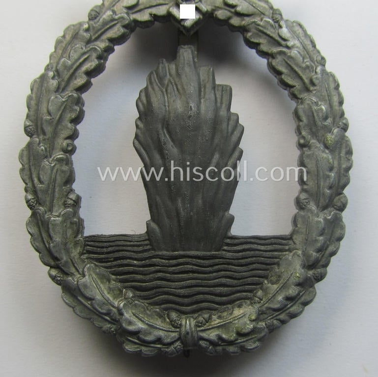 WH (Kriegsmarine) 'Kriegsabzeichen für Minensuch-, U-Boot-Jagd und Sicherungs-Verbände' being a detailed albeit non-maker-marked and 'Feinzink'-based example as was produced by the: 'Förster & Barth'-company