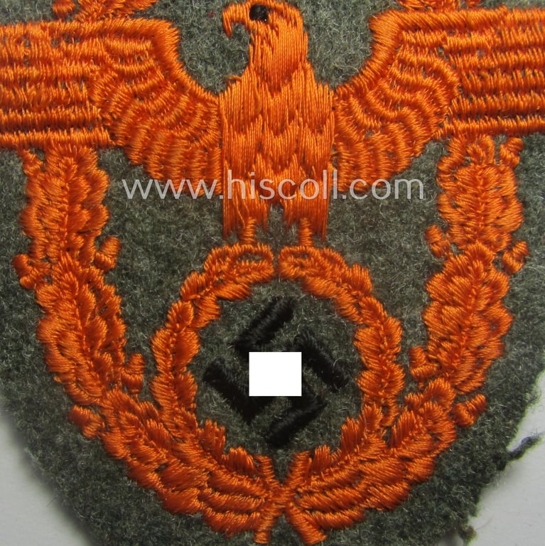 Field-police- (ie. WH (Heeres) related-) arm-eagle (ie. 'Ärmeladler') as was intended for usage by the staff of the notorious 'Feldgendarmerie-Truppen'