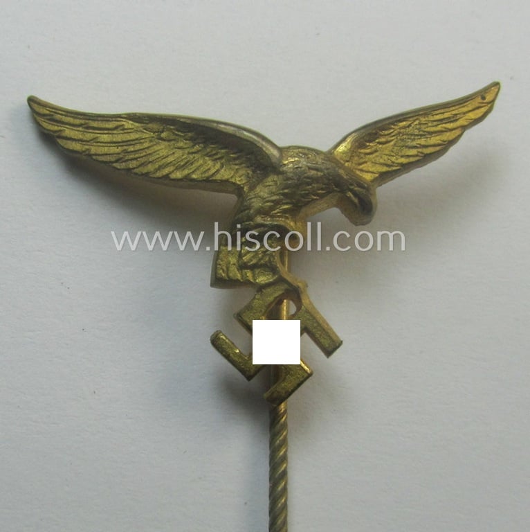 Bright golden-toned lapel-pin (ie. 'Zivilabzeichen') to be worn on the civil attire as was intended for usage by the various staff-members of the 'Luftwaffe' (depicting an early-pattern- ie. 'down-tailed'-eagle-device)