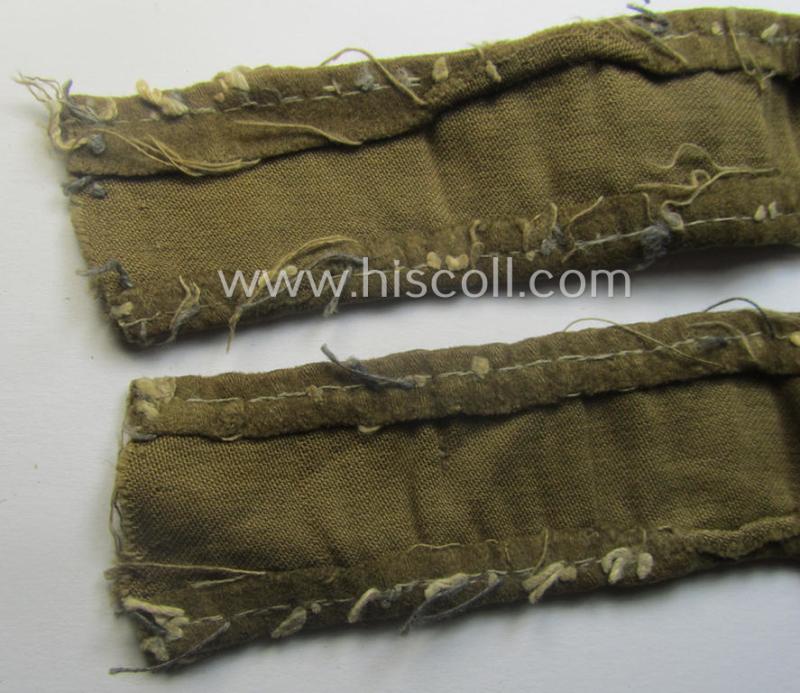 Neat, WH cuff-title (ie. 'Ärmelstreifen') entitled: 'Afrika' that comes in a clearly issued, worn- and/or most certainly once tunic-attached, condition