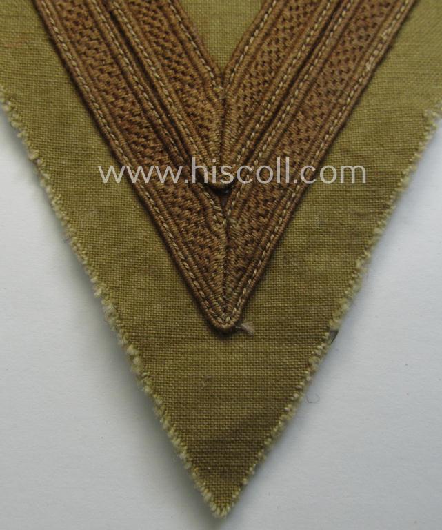 WH (Luftwaffe) tropical-styled, 'Armwinkel' (or: arm-chevron) as executed on typical beige- ie. tan-coloured linnen as was specifically intended for usage by a soldier with the rank of an: 'Obergefreiter'