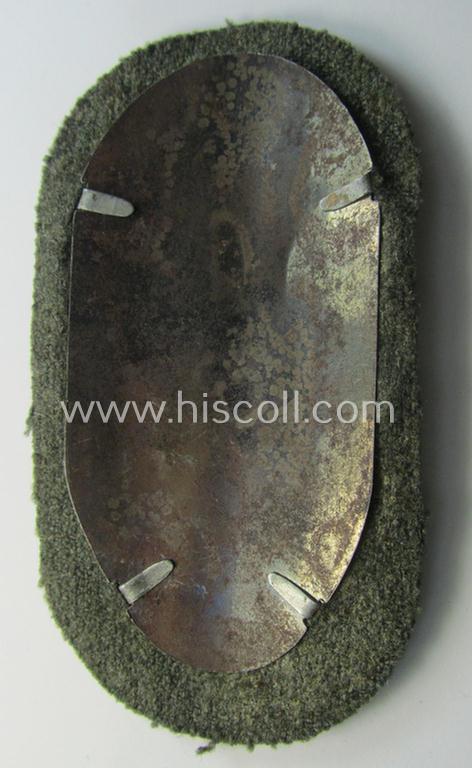 Superb example of a - fairly scarcely encountered! - WH (Heeres ie. Waffen-SS) 'Demjansk'-campaign-shield as executed in typical magnetic metal (ie. so-called: 'Eisenblech') and that comes in an overall very nice- ie. fully untouched, condition