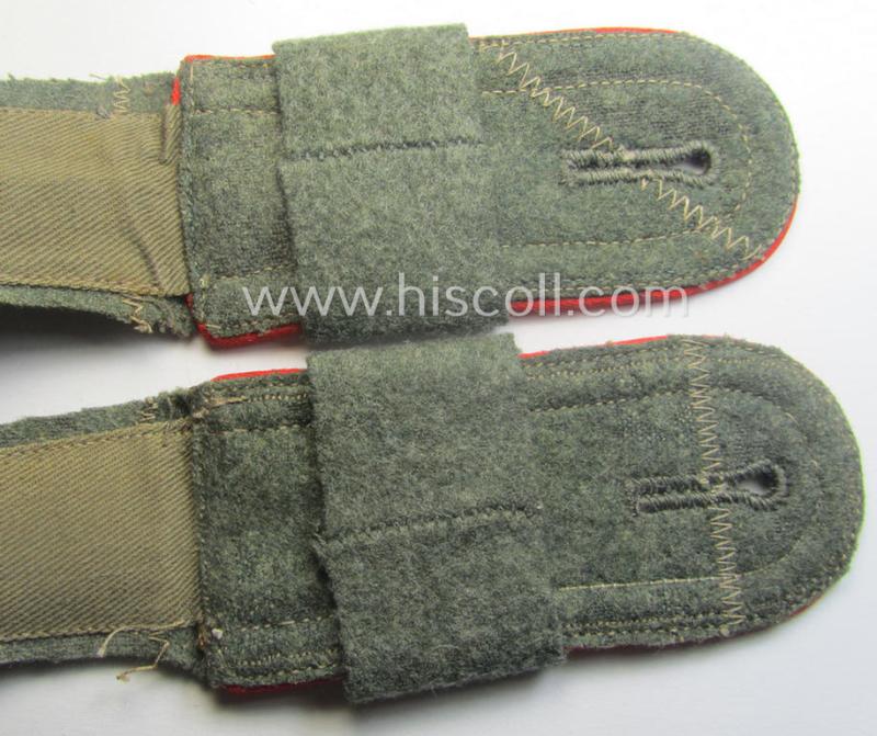 Pair of mid-war-period, so-called: 'M41 o. M43'-pattern, WH (Heeres) NCO-type shoulderstraps that comes with its accompanying 'Überschube'-pair as was intended for an: 'Unterwachtmeister des Artillerie-Rgts. 239'