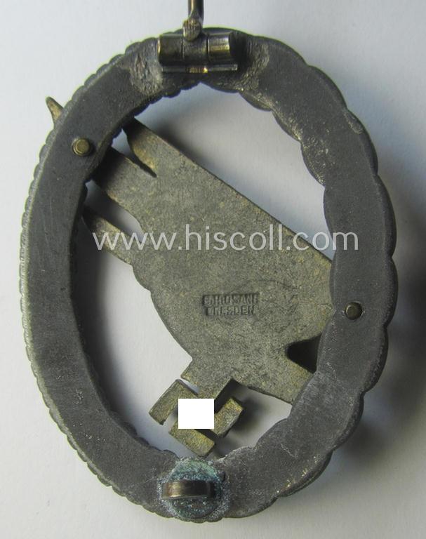 Zinc- (ie. 'Feinzink'-) based version of a WH (Luftwaffe) 'Fallschirmschützen-Abzeichen' (being a maker-marked, 'Type A'-pattern example as was produced by the 'G.H. Osang'-company)