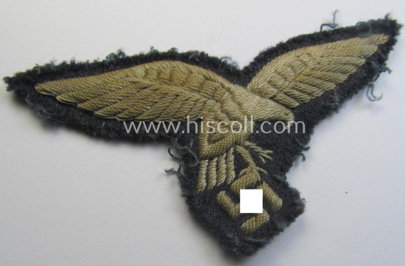 Interesting, 'Extra Qualität', WH (LW) EM/NCO- (evt. officers'-) type, hand-embroidered breast-eagle (ie. 'Brustadler für Mannschaften u. Uffz. der LW') being a so-called: 'down-tailed'-example that comes in a carefully tunic-removed, conditio...