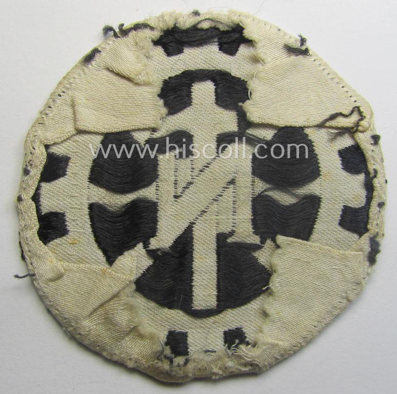 Truly used - and most certainly scarcely found! - Dutch-related, TeNo- (ie. 'Technische Nothilfe'-) related armband-patch (ie. 'Abz. für den TeNo-Armbinde') being of the 'BeVo-woven'-type showing the typical 'TeNo'-symbol