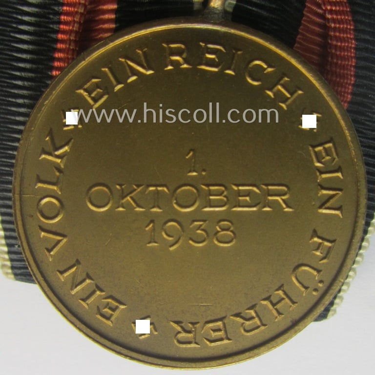 Bright golden-toned WH (Heeres o. KM etc.) so-called: 'Einzelspange' showing a WH Czech 'Anschluss'- (ie. occupation-) medal: '1 October 1938'