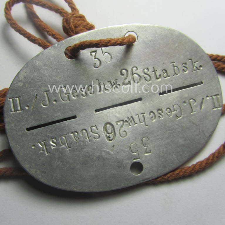 Superb, aluminium-based, WH (LW) ie. 'Flieger'-related ID-disc bearing the stamped unit-designation that simply reads: 'II./J.Geschw. 26 Stabsk.' (and as such belonging to a staff-member ie. pilot serving within the famous: 'Jagdgeschwader 26')