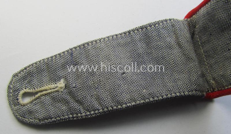Neat - albeit regrettably single! - WH (LW) EM-type: 'Flakartillerie' shoulderstrap as was specifically intended for the bluish-grey (ie. 'blaumelliertes') summer-shirt and that comes in an overall nice- (albeit moderately used- ie. worn-), condi...