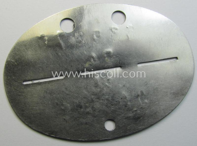 Stainless-steel-based, WH (LW) ie. 'Flieger'-related ID-disc, bearing the stamped- and/or: 'coded'-unit- ie. 'MOB'-designation that reads: '53927C' (and as such belonging to a soldier who served within the: '2. Kampf-Geschw. 101 / E.S. Ost'...