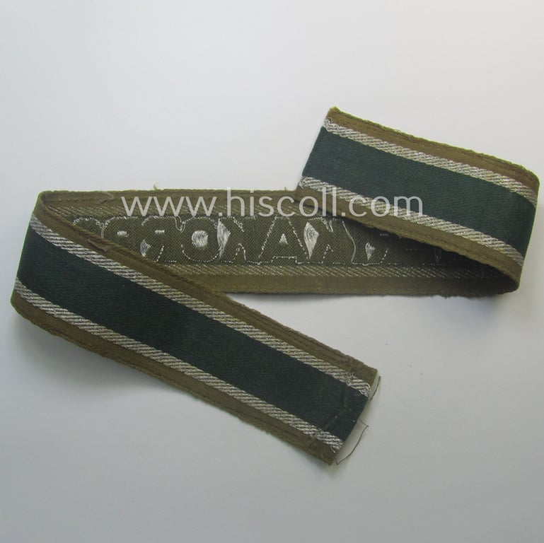 'BeVo'-like cuff-title (ie. 'Ärmelstreifen') entitled: 'Afrikakorps' being a clearly issued example that comes in an overall nice- (ie. hardly shortened- and just moderately worn-), condition