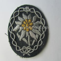 Moderately used, WH (Heeres) neatly hand-embroidered- and/or typical...