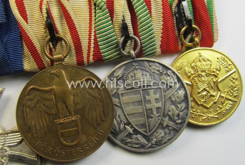 Superb, 5-pieced WWI- (ie. TR-) related medal-bar (ie. 'Ordenspange') resp. depicting an: 'FKK 1914-18 mit Schw.', a: 'Polizei-Dienstauszeichnung 2. Stufe' (or: police loyal-service medal 2nd class) and three Austrian WWI commemorative medals