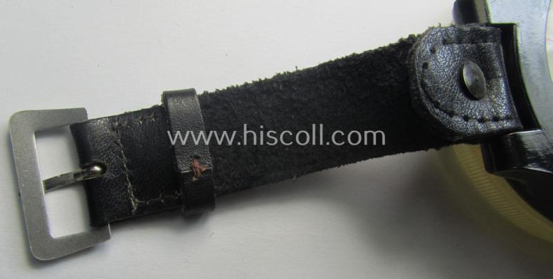 Attractive - and/or fully functional! - example of a WH (Luftwaffe) black-coloured- and/or resin-based, pilots'-armband-compass of the type: 'AK 39' that comes mounted onto its period, bluish-black-coloured strap as issued and/or used