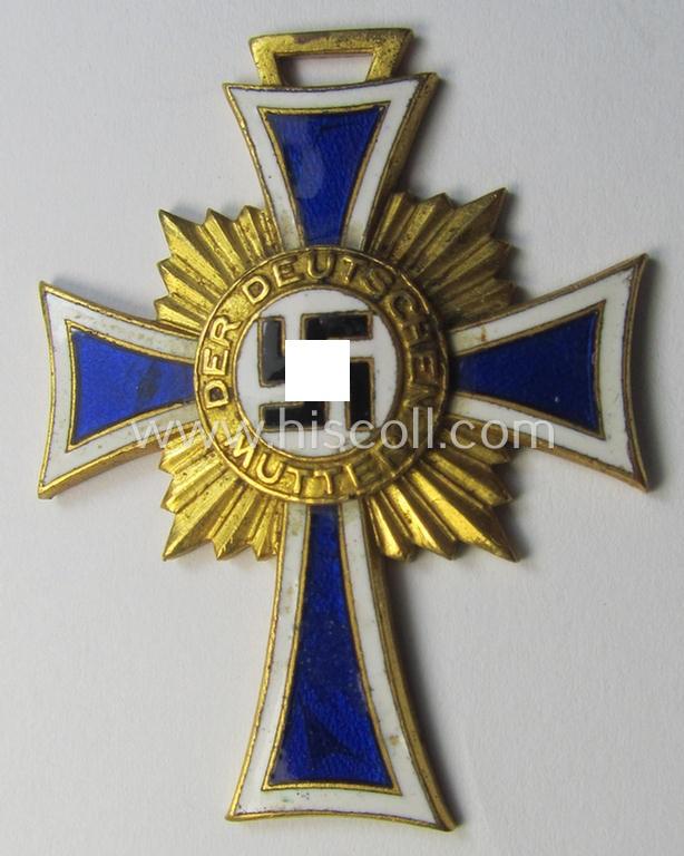 Attractive, 'Ehrenkreuz der deutschen Mutter - erste Stufe' (or: golden-class mothers'-cross) being a 'virtually mint' example that comes with its accompanying, long-sized- (and also 'mint'!) ribbon as issued and/or recently found