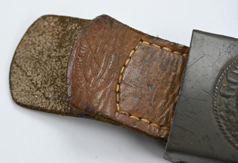 German WH Beltbuckle with Schrapnel damage and Tab 'E.Schneider'