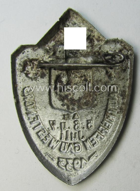 Attractive, silver-toned- (and I deem typical 'Eisenblech'-based) so-called: N.S.D.A.P.-related day-badge (ie. 'tinnie' or: 'Veranstaltungsabzeichen') as was issued to commemorate the: 'Gautreffen - Gau Westf.-Nord - 5.-, 6.- u. 7. Juli 1935'
