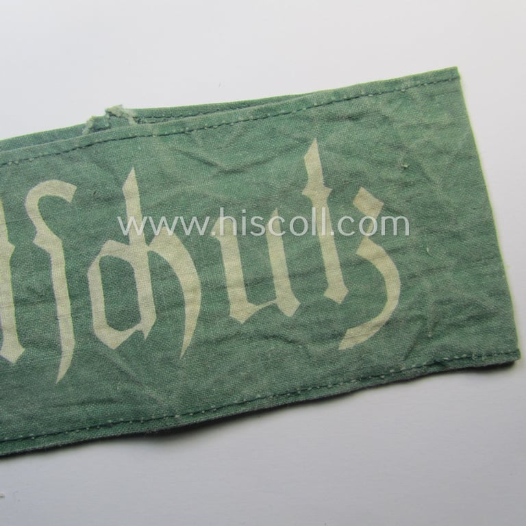 Clearly used - and most certainly not that often seen! - 'Reichsluftschutzbund' (ie. 'RLB'-) related service-armband (ie. 'Armbinde') being of the 'entirely printed'-type showing the text: 'Luftschutz'