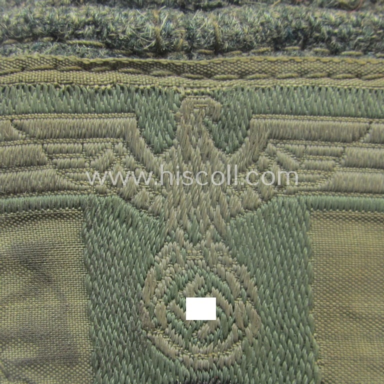 WH (Heeres) so-called: 'T-shaped'- (ie. 'M42-pattern') cap-eagle/cocarde (ie. cap-trapezoid) as executed in 'BeVo'-weave pattern that comes still mounted onto its 'cut-out' field-cap 'front-piece'