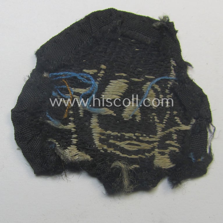 Superb - and nowadays rarely encountered! - Waffen-SS, 'BeVo'-woven-style skull- and cap-eagle-set (ie. 'Totenkopf- u. Adler-Effektensatz für Schiffchen o. Einheitsfeldmütze') that comes in a moderately used- and/or cap-removed, condition