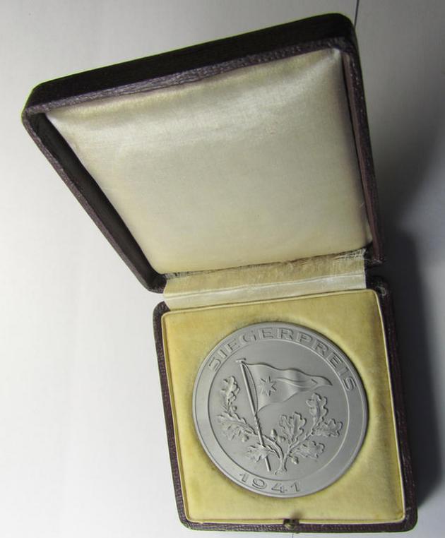 Attractive, silver-greyish-toned- (ie. 'zinc'-based) so-called: WH sports-related commemorative-plaque entitled: 'Siegerpreis 1941 - Dresden Vereinsregatta' and that comes stored in its period etui