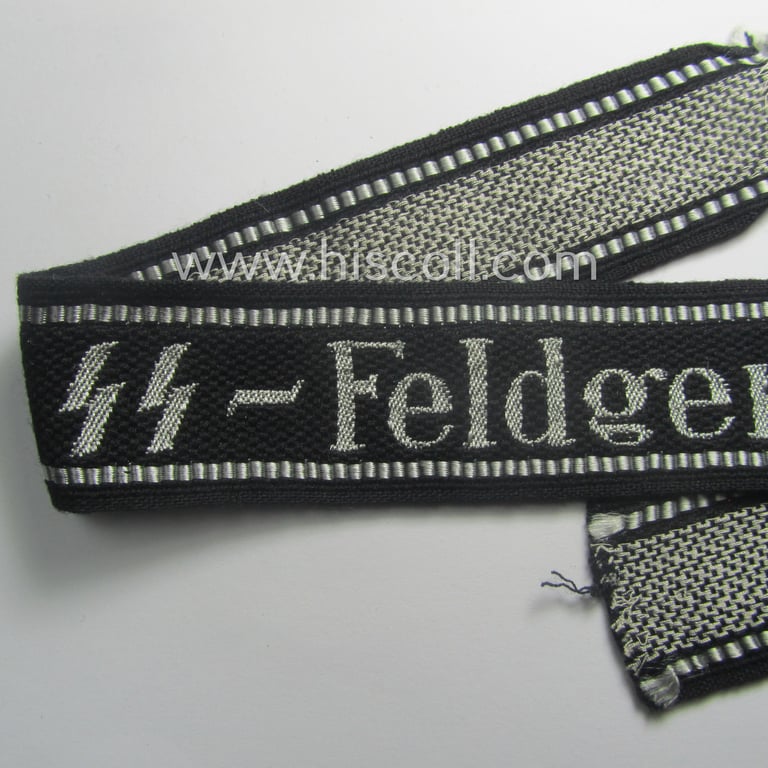 Superb - and truly rarely encountered! - example of a Waffen-SS, 'semi-BeVo'-pattern, EM- (ie. NCO-) type cuff-title (ie. 'Ärmelstreifen') as was intended for a member serving within the: 'SS-Feldgendarmerie'