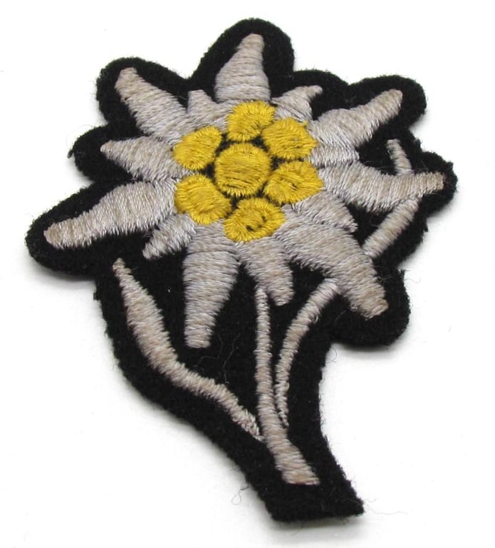 Waffen SS 'Gebirgsjäger' Edelweiss cloth cap badge