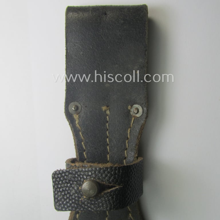 Genuine-leather-based- and/or black-coloured, 'standard-pattern' WH (Heeres, Waffen-SS, Luftwaffe etc.) so-called: K98 bayonet-frog (ie. 'Tragetasche o. Koppelschuh') being a maker-marked (ie. 'RbN.'-numbered) example