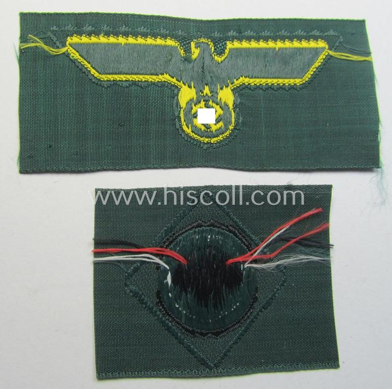 Neat, WH (KM ie. 'Küsten-Marine o. Marine-Artillerie') side-cap-eagle and cocarde-set (being a 'virtually mint- ie. unissued' set as executed in golden-yellow-coloured linnen on a darker-green-coloured background)