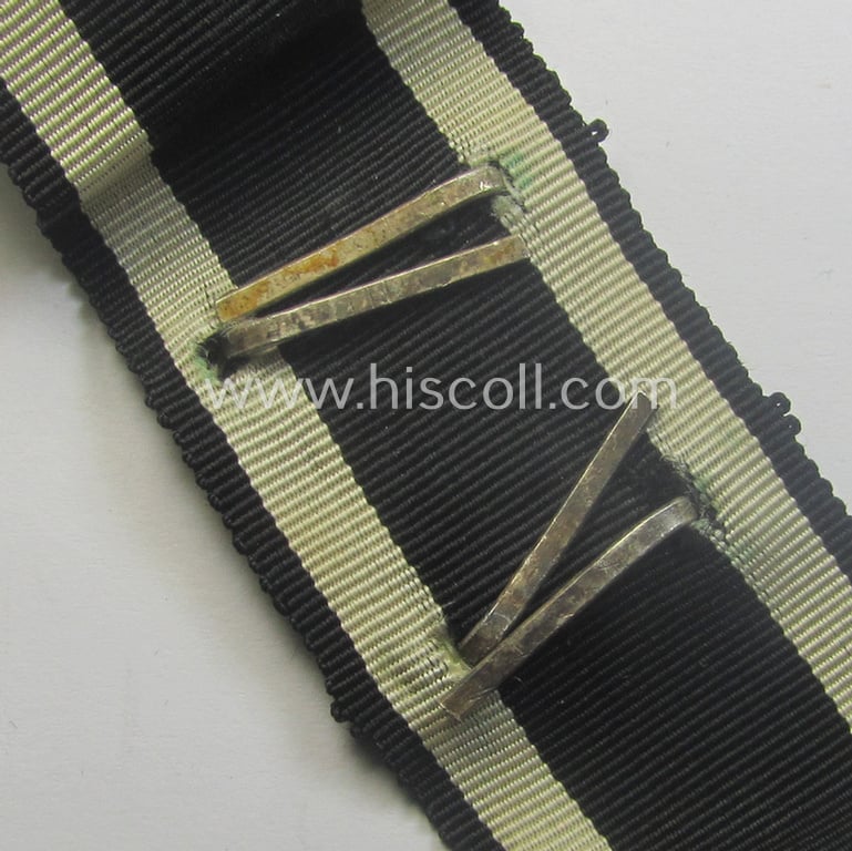 'Wiederholungsspange zum EK II. Klasse' (or: bar to the WWI IC second class) as was produced by the (scarcely found!) maker (ie. 'Hersteller') named: 'Ziemer & Söhne'