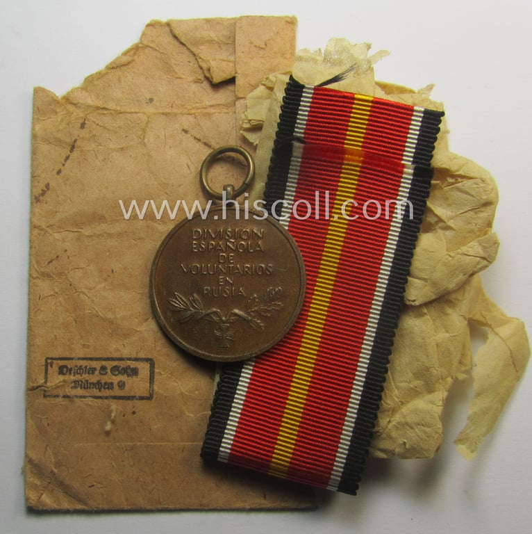 'Errinnerungsmedaille für die Spanischen Freiwilligen im Kampf gegen den Bolschevismus' being a (typical) non-maker-marked example by: 'Deschler & Sohn' in its 'Zellstoff'-based pouch