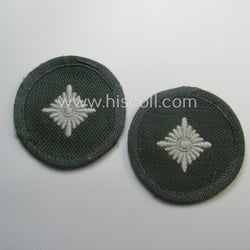 WH (Heeres) rank-insignia (ie. arm-roundel) as was specifically...
