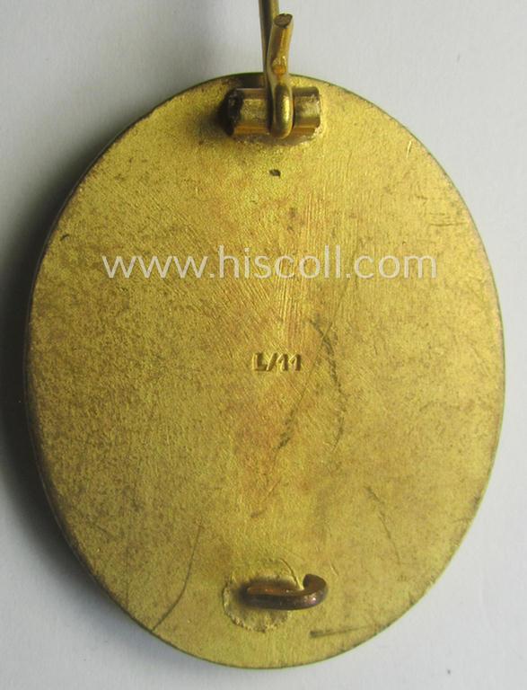 Rarely encountered 'Verwundeten-Abzeichen in Gold' being a clearly maker- (ie. 'L/11'- by 'Wilh. Deumer') marked- and typical 'Buntmetall'-based example that comes stored in its period- (and LDO-marked!) etui