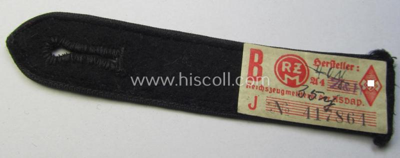 Neat - and naturally single! - black-piped 'DJ- o. Deutsches Jungvolk' shoulderstrap as was intended for usage by a: 'DJ-Mitglied' who served within the: 'Bann 310' (310 = 'Donau') and that comes with its period-attached 'RzM'-etiket