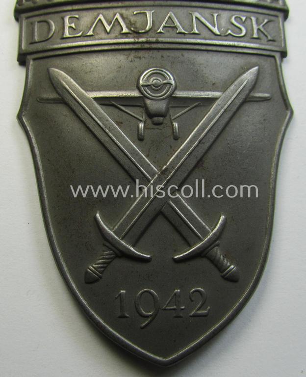 'Virtually mint' - albeit regrettably incomplete - example of a WH (Heeres ie. Waffen-SS) 'Demjansk'-campaign-shield as executed in typical magnetic, so-called: 'Eisenblech'