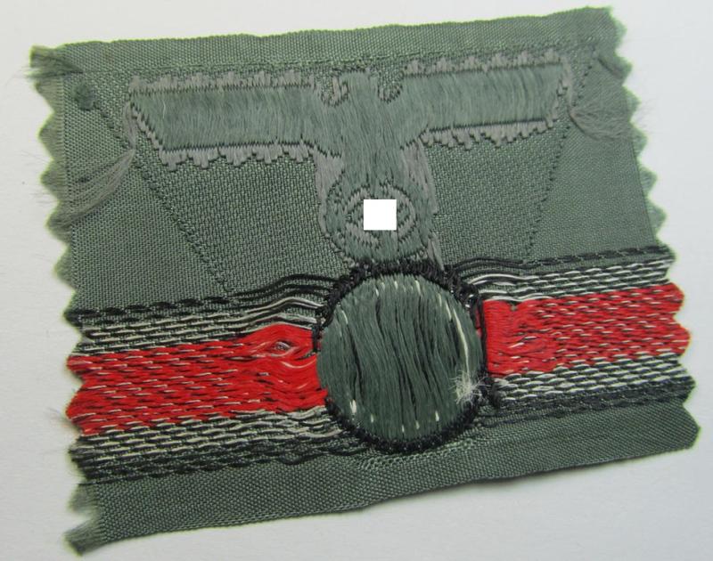 WH (Heeres) so-called: 'M43-pattern') cap-eagle/cocarde (ie. cap-trapezoid) as was specifically produced for usage on the so-called: 'M-43'-model field-caps (ie. 'Einheitsfeldmützen')