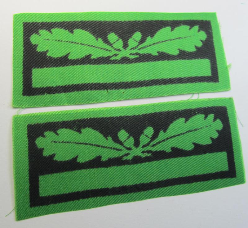 Attractive - and fully matching! - pair of officers'-pattern, WH (Heeres o. Waffen-SS) rank-insignia-bars (for usage on the various camouflaged-uniforms) as was used by an officer holding the rank of: 'Leutnant' (ie.: 'SS Untersturmführer')