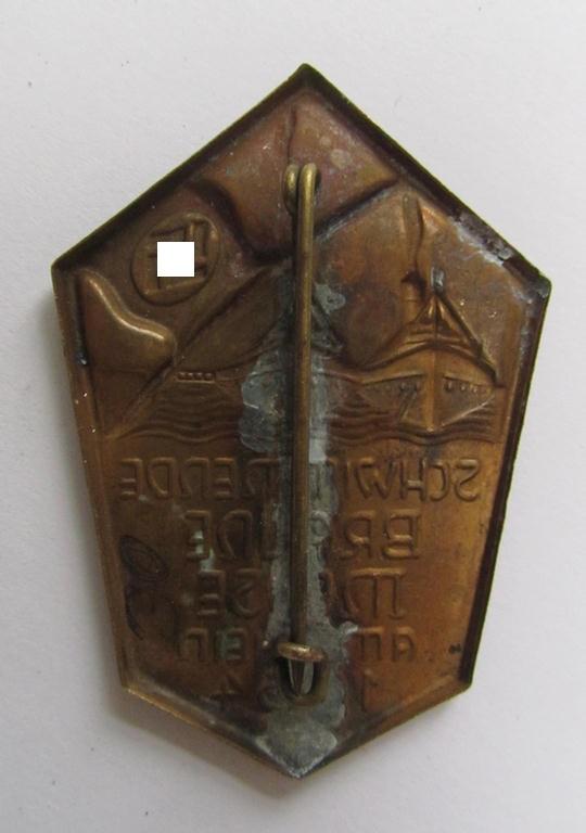 Commemorative - copper-based- and/or copper-coloured - N.S.D.A.P.-related 'tinnie', being a non-maker marked example, depicting a raised swastika-flag and two ships with below the text: 'Schwimmende Braune Messe am Rhein 1934' 