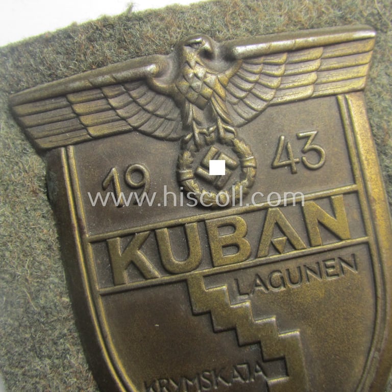 Attractive - truly worn and actually scarcely encountered! - WH (Heeres ie. Waffen-SS) 'Kuban'-campaign-shield that comes mounted onto its original field-grey-coloured- and/or woolen-based 'backing' as issued and/or used