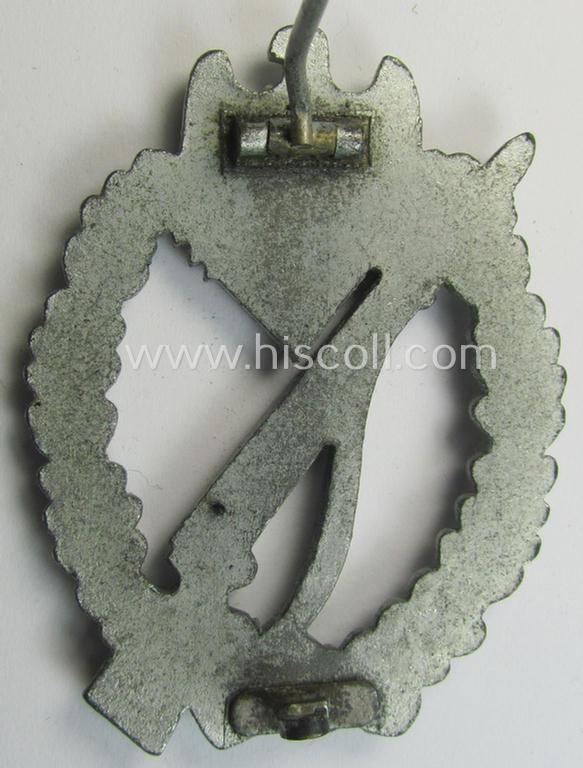 Attractive, 'Infanterie Sturmabzeichen in Silber' (or: silver-class infantry assault badge ie. IAB) being a detailed albeit unmarked example (of the 'long-barrel-hinge'-variant) as executed in 'Feinzink' as was produced by the: 'Steinhauer & L...