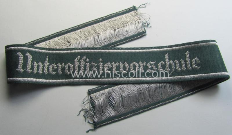 Superb example of an - actually scarcely encountered! - WH (Heeres) linnen-based cuff-title (ie. 'Ärmelstreifen') entitled: 'Unteroffiziervorschule' (as was executed in so-called: 'flat-wire'-style- ie. 'BeVo-weave'-pattern)