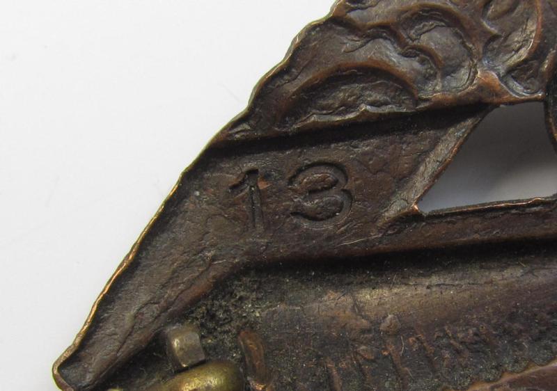 Attractive - and presumably Dutch-produced! - example of a (male) NJS- (or: 'Nationale Jeugdstorm'-) related youth-sports-badge of the bronze-class (being an attractive example that shows a unique- and very low engraved serial-number that reads '1...