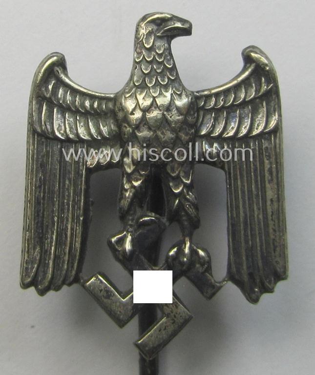 Silver-toned- (and: 'Buntmetall'-based) WH (Heeres) so-called: 'Zivilabzeichen' (or: army civil-attire badge) being a very detailed (and: 'A'- ie. 'Assmann & Söhne'-marked) example that comes mounted onto its long-sized pin
