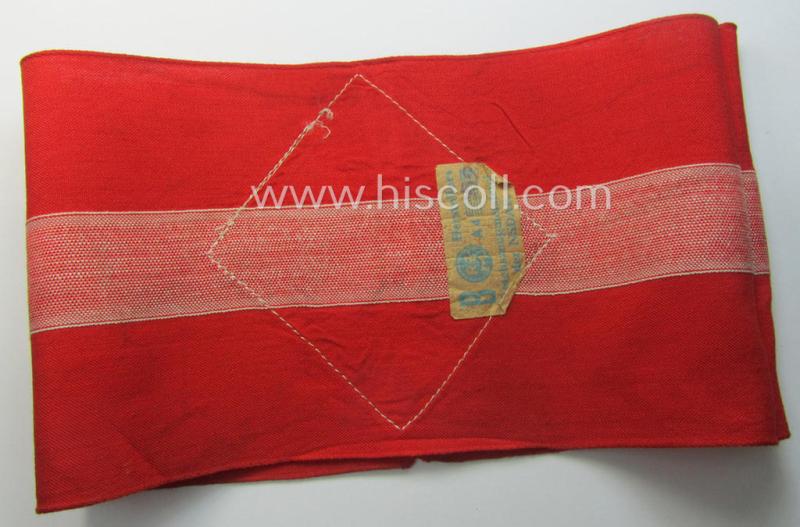 'Standard-issued'-pattern (ie. entirely woven) pattern, bright-red-coloured HJ- (ie. 'Hitlerjugend'-) related armband (ie. 'Armbinde') being a moderately worn- ie. used example that still retains its period 'RzM'-etiket
