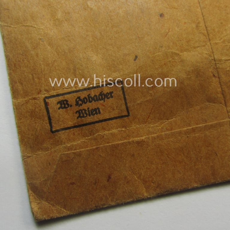 Medal-set: 'Deutsches Schutzwall Ehrenzeichen' (aka: 'Westwall'-medal) being a (typical) non-maker-marked- and/or: typical 'Buntmetall'-based specimen that comes packed in its original pouch of issue by the: 'Wilh. Hobacher'-company