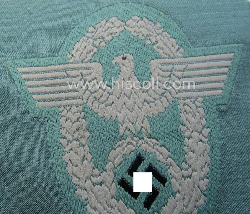 Police- (ie. 'Polizei'-) related armbadge (ie. arm-eagle) being a typical 'BeVo'-woven example