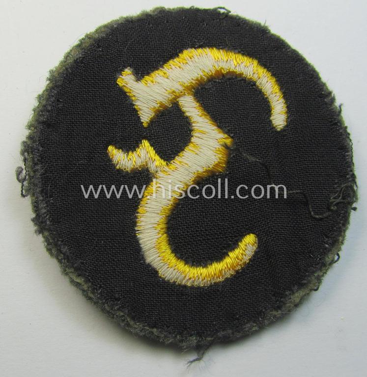 WH (Heeres) so-called: trade- and/or special-career arm-insignia (ie. 'Laufbahn- o. Tätigkeitsabzeichen') as was specifically intended for an army: 'Feuerwerker' (being a neatly machine-embroidered variant on field-grey-coloured wool)